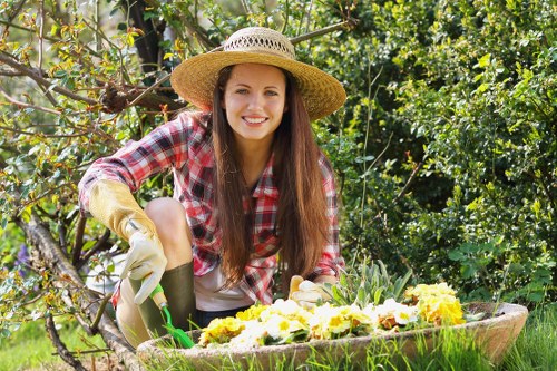 Professionals clearing overgrown garden in Sanderstead